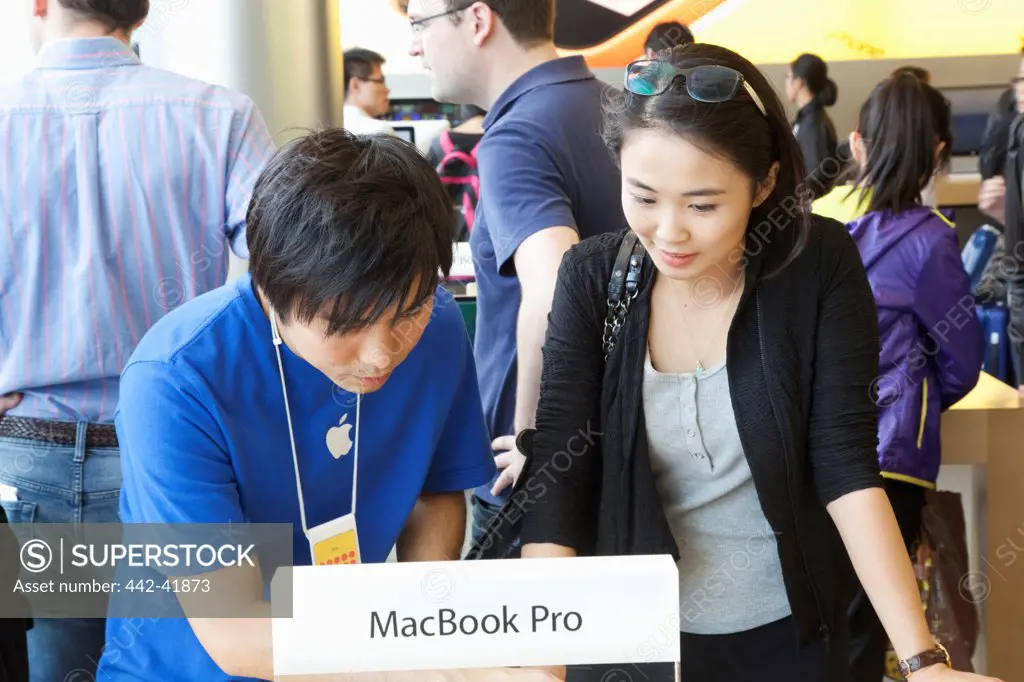 China, Hong Kong, Apple Store, Customers Looking at Products