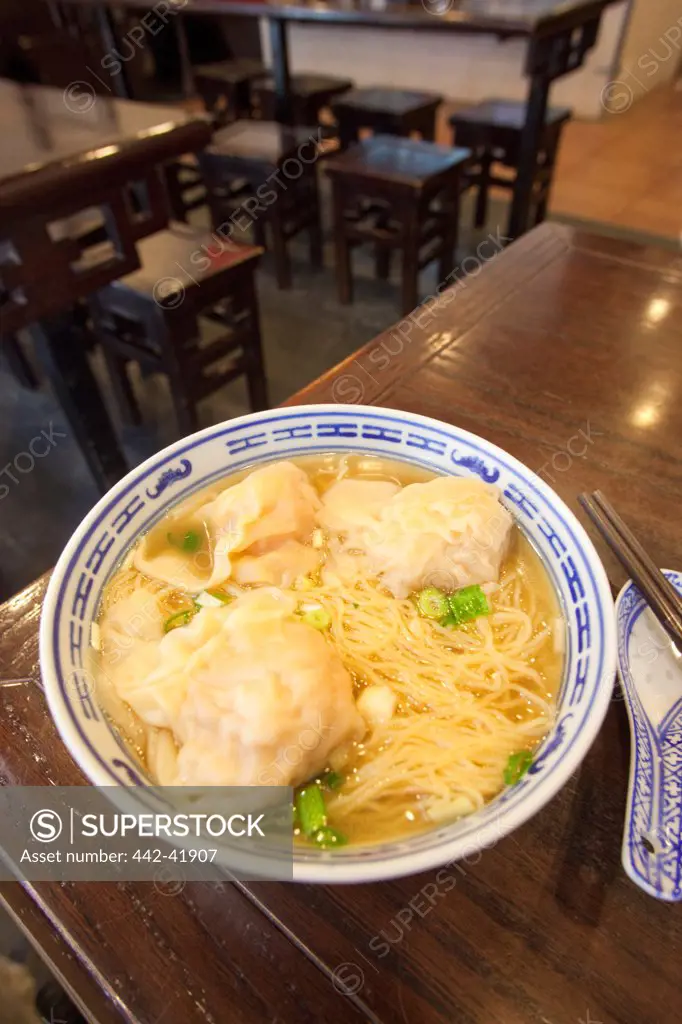 China, Hong Kong, Bowl of Dumplings and Noodles