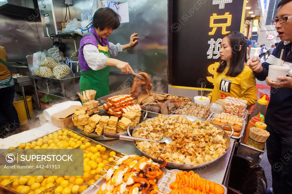 China, Hong Kong, Kowloon, Mong Kok, Street Stall Selling Tofu Based Fast Food