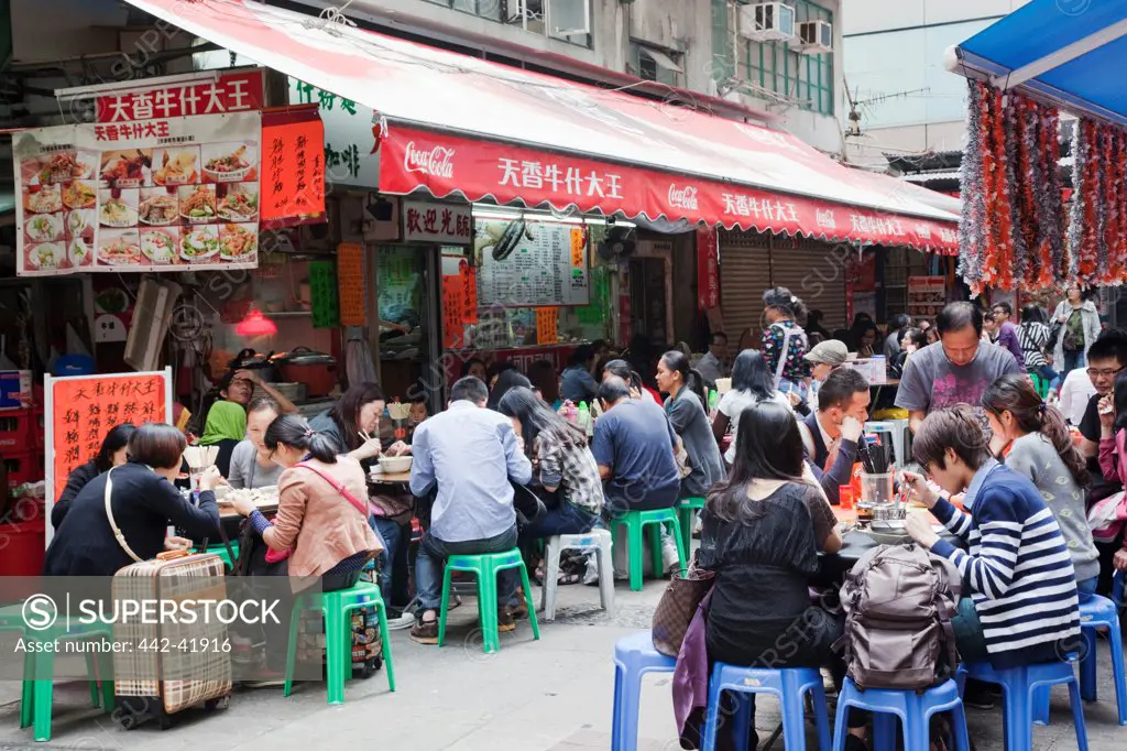 China, Hong Kong, Causeway Bay, People Eating at Outdoor Restaurants