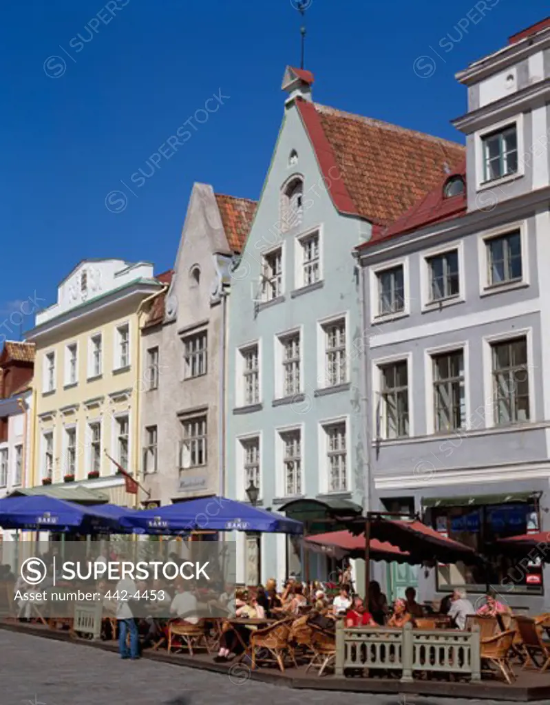 Sidewalk cafe in front of buildings, Town Hall Square, Old Tallinn, Estonia