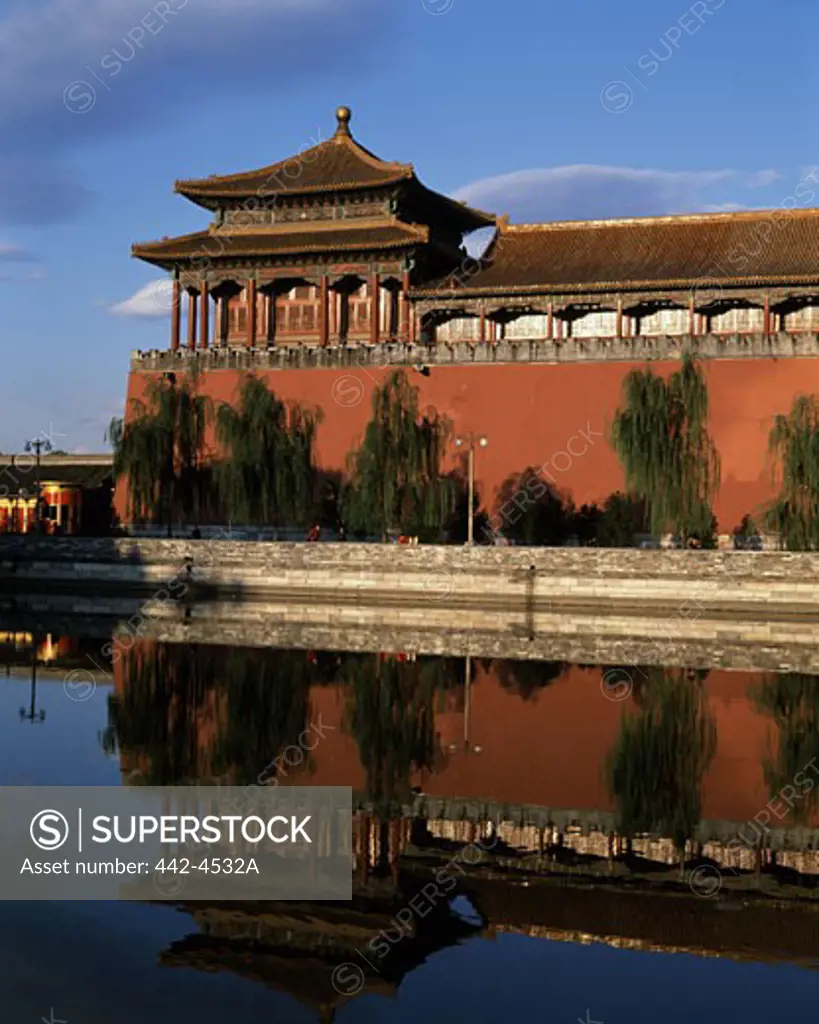 Refection of a building in water, Forbidden City, Beijing, China