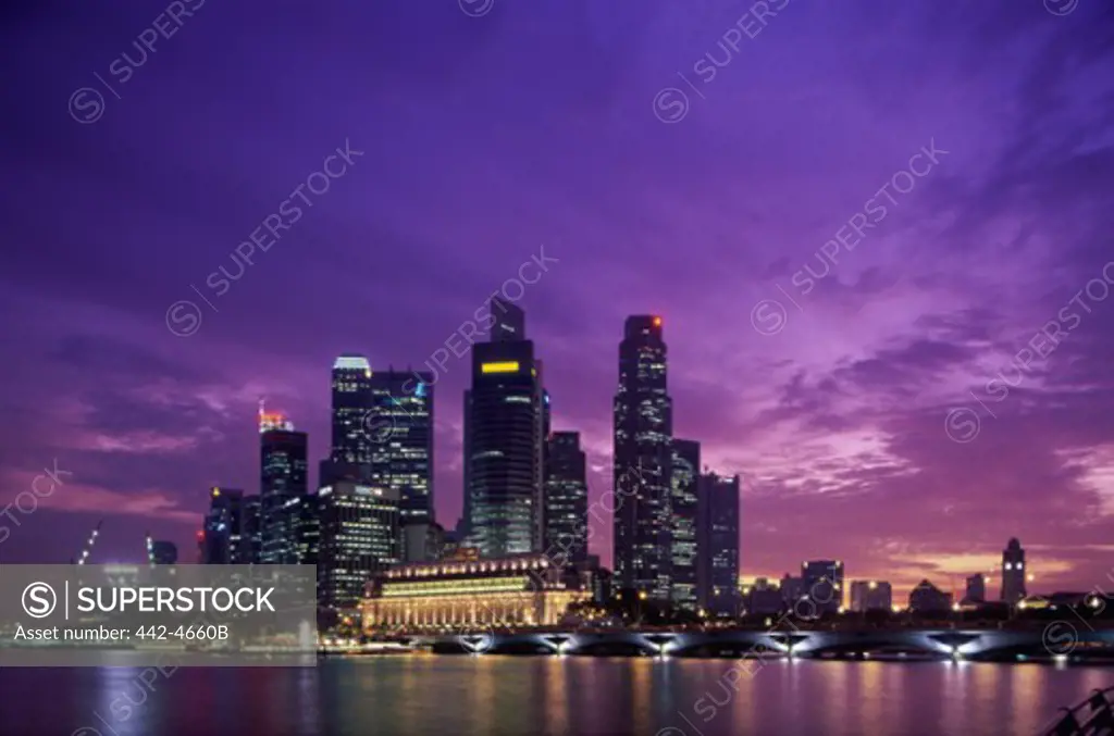 Skyscrapers lit up at night, Singapore