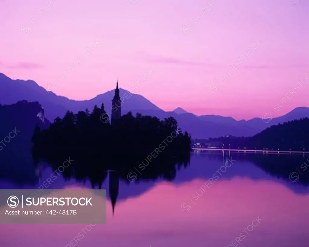 Church on an island at dusk, Lake Bled, Julian Alps, Slovenia