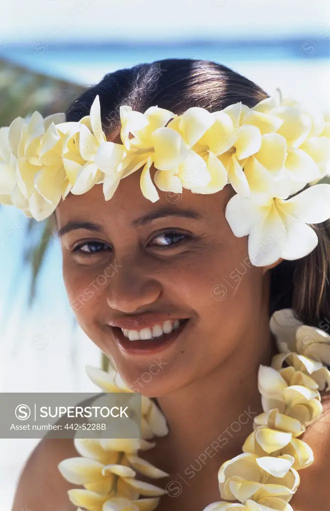 Portrait of a young woman smiling, Aitutaki, Cook Islands