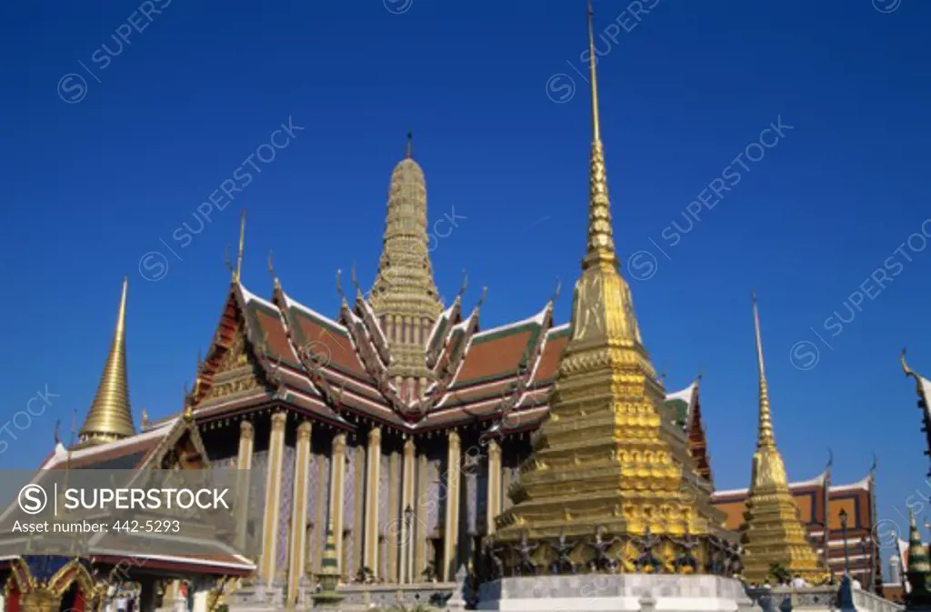 Buddhist temple with a golden spire, Wat Phra Kaeo, Bangkok, Thailand