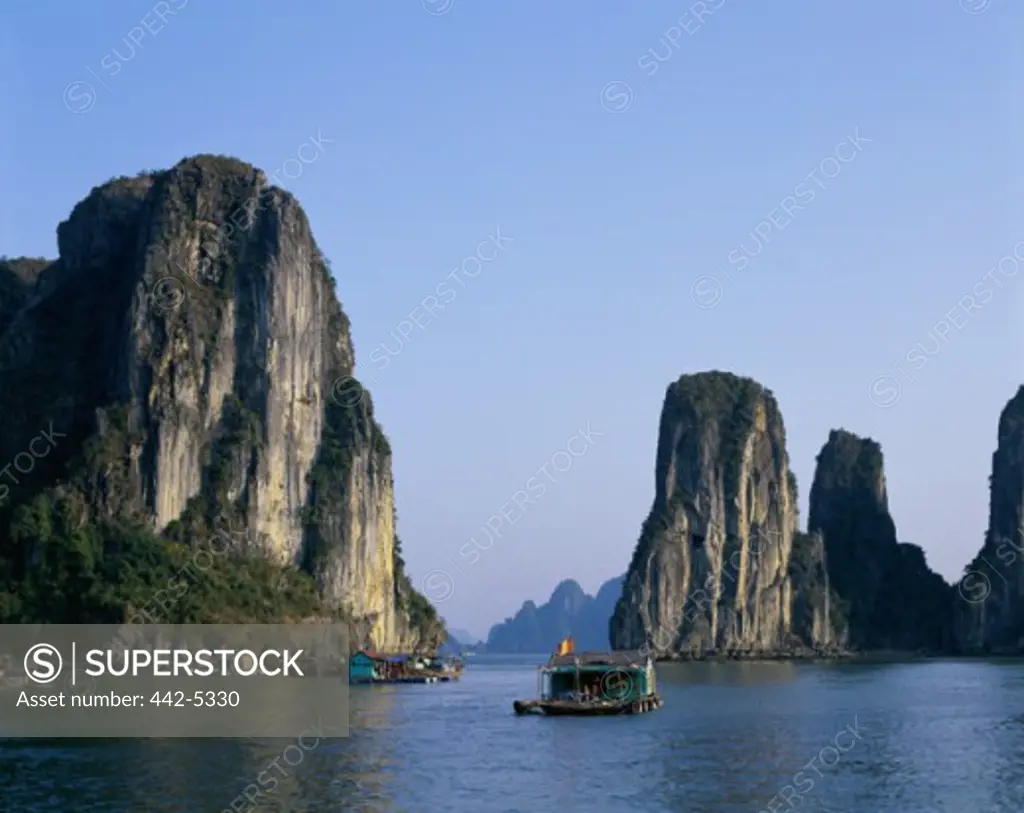 Boats in a river, Ha Long Bay, Vietnam