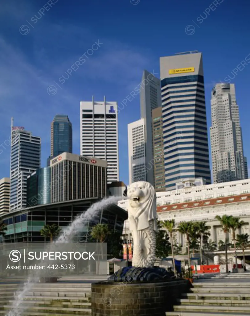 Low angle view of a statue in front of buildings, Merlion Statue, Singapore