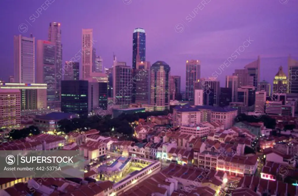 Buildings lit up at night in a city, Chinatown, Singapore