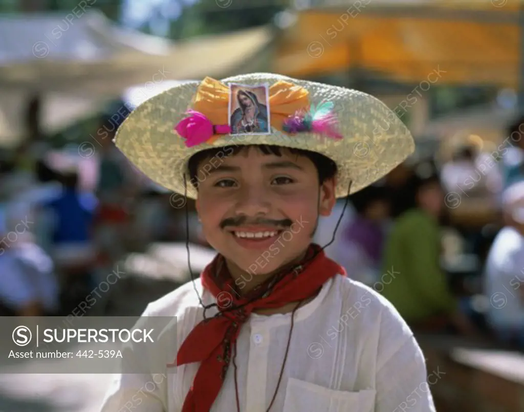 Close-up of a boy with a painted mustache, Oaxaca, Mexico