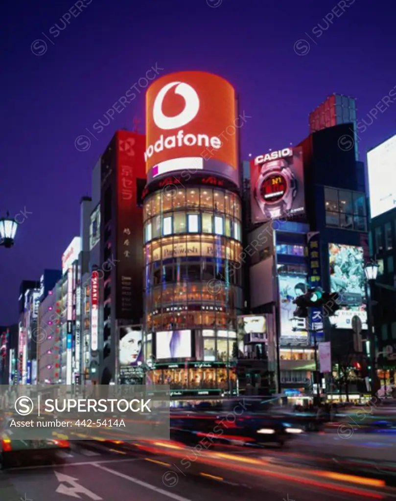 Shopping mall and stores lit up at night, Ginza, Tokyo, Japan