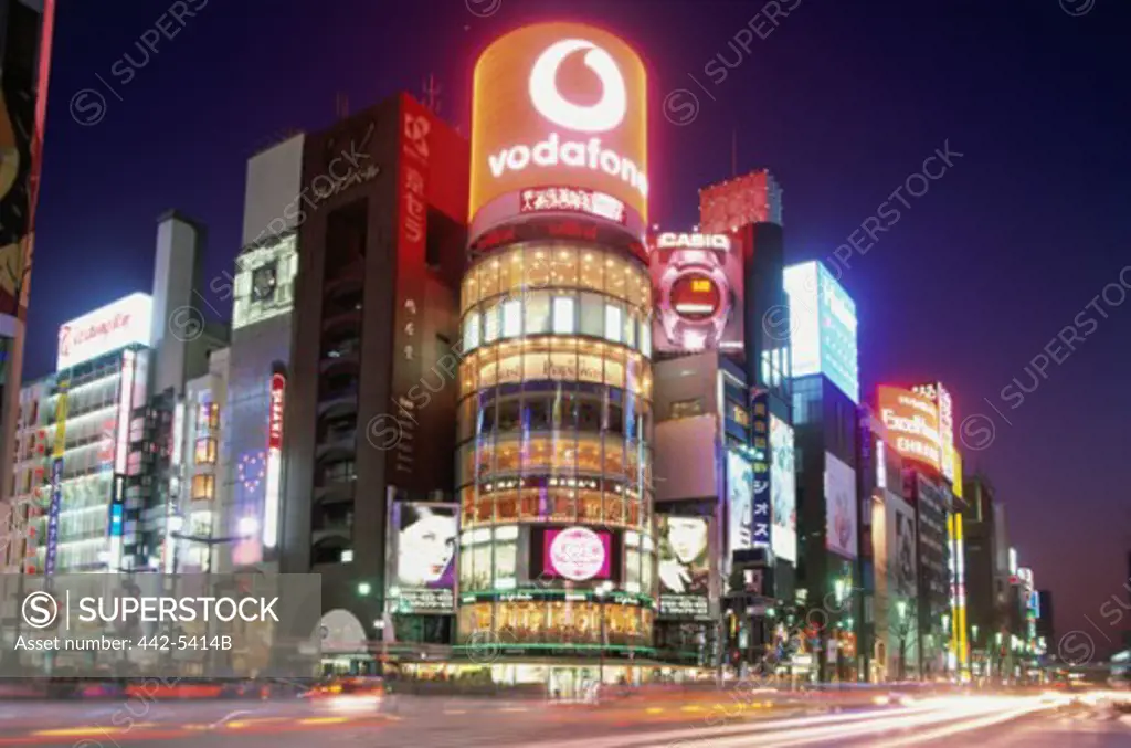 Shopping mall and stores lit up at night, Ginza, Tokyo, Japan