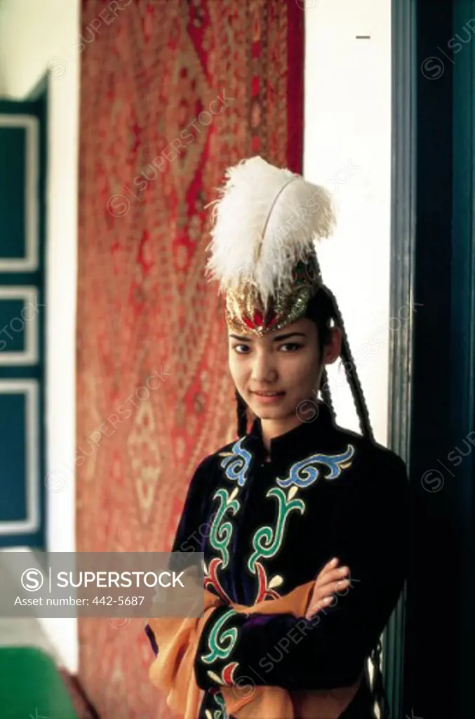 Portrait of a teenage girl dressed in a traditional Uigur costume, Urumqi, China