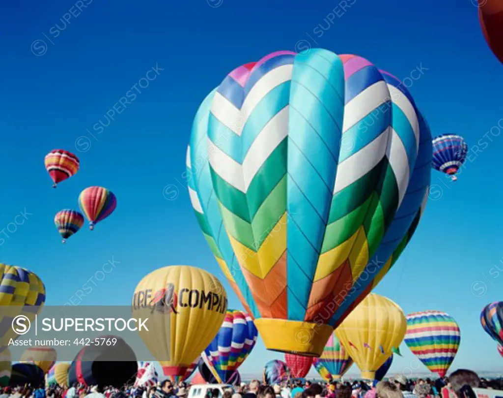 Low angle view of hot air balloons taking off, Albuquerque International Balloon Fiesta, Albuquerque, New Mexico, USA