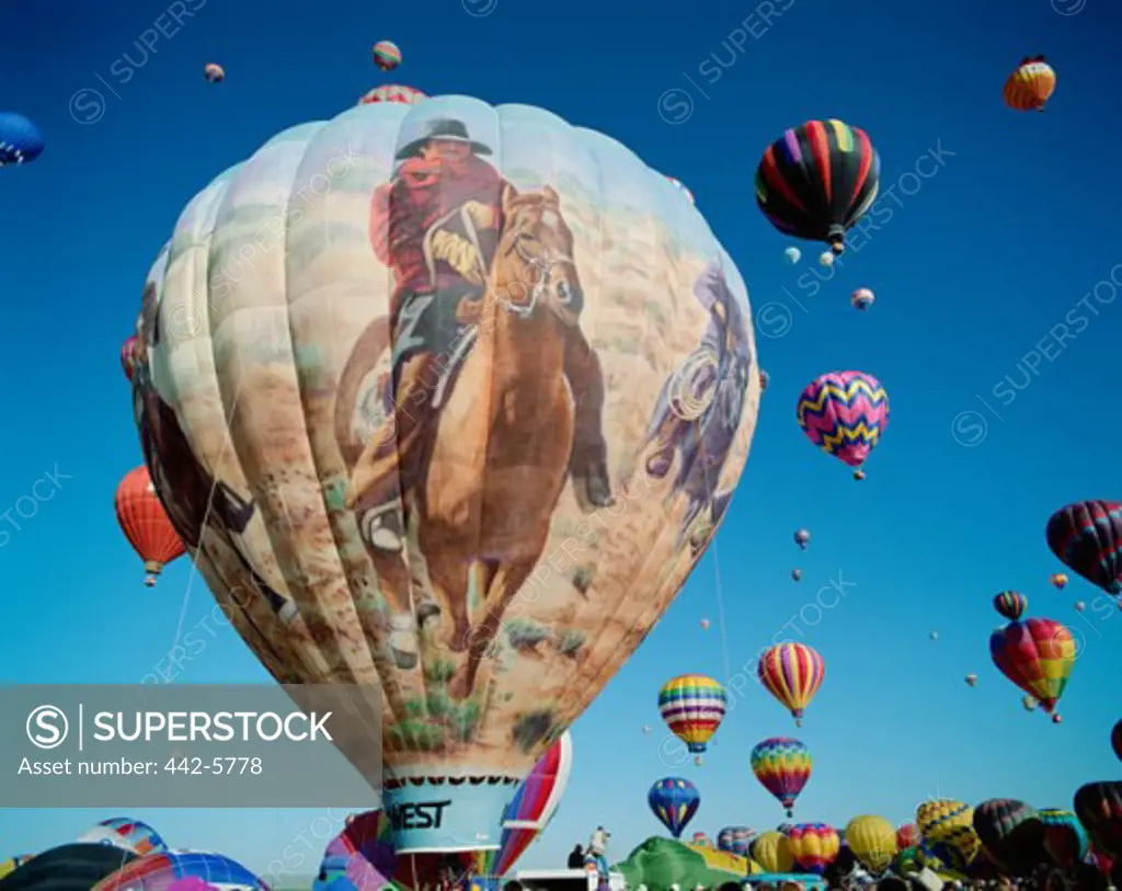 Low angle view of hot air balloons in the sky, Albuquerque International Balloon Fiesta, Albuquerque, New Mexico, USA