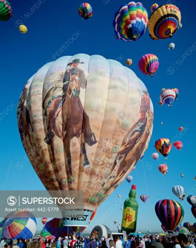 Low angle view of hot air balloons in the sky, Albuquerque International Balloon Fiesta, Albuquerque, New Mexico, USA