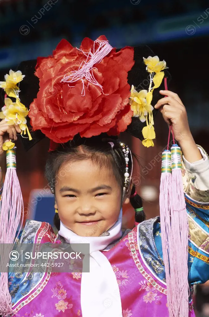 Girl dressed in a traditional costume, Beijing, China