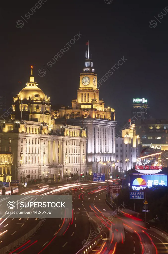 Colonial buildings lit up at night, The Bund, Shanghai, China
