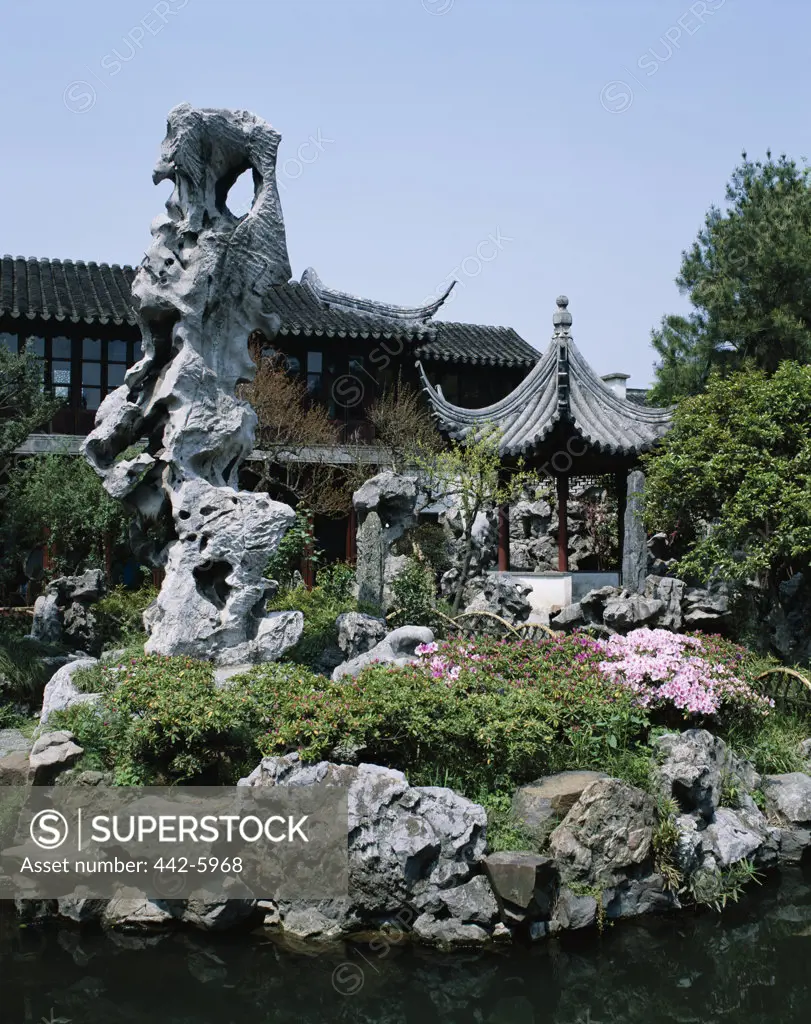 Rock in a flower bed, Cloud Crowned Peak Rock, Lingering Gardens, Suzhou, China