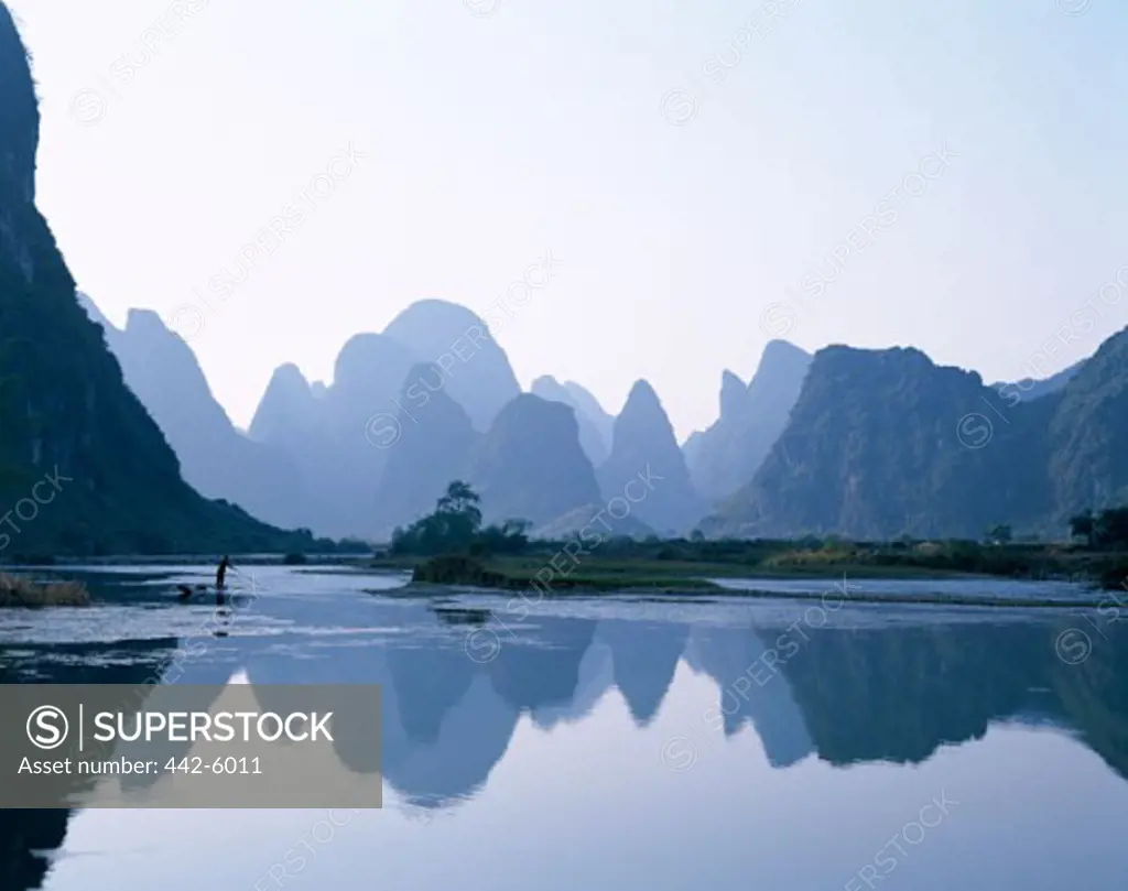 Person in a boat, Li River, Guilin, Yangshou, China