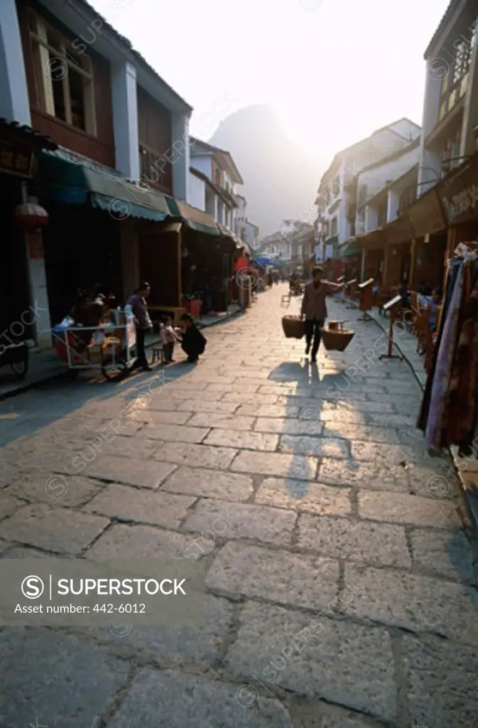 Buildings along a cobblestone street, Guilin, Yangshou, China