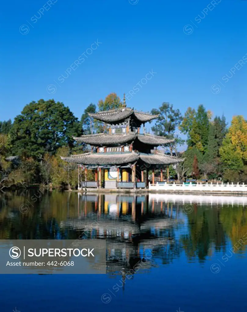 Reflection of a pagoda in water, Deyue Pavilion, Black Dragon Pool Park, Lijiang, China