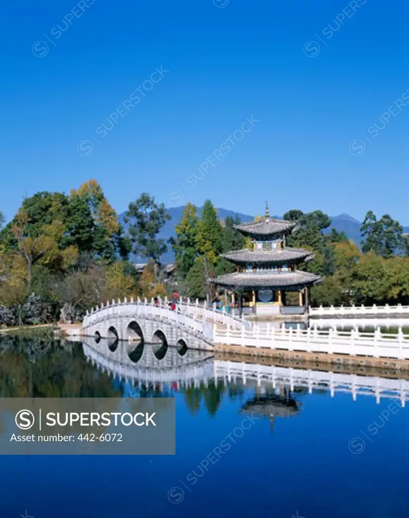 Reflection of a pagoda in water, Deyue Pavilion, Black Dragon Pool Park, Lijiang, China