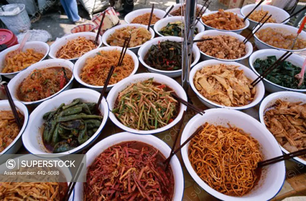 Close-up of local foods on display, Market Square, Old Town, Lijiang, China