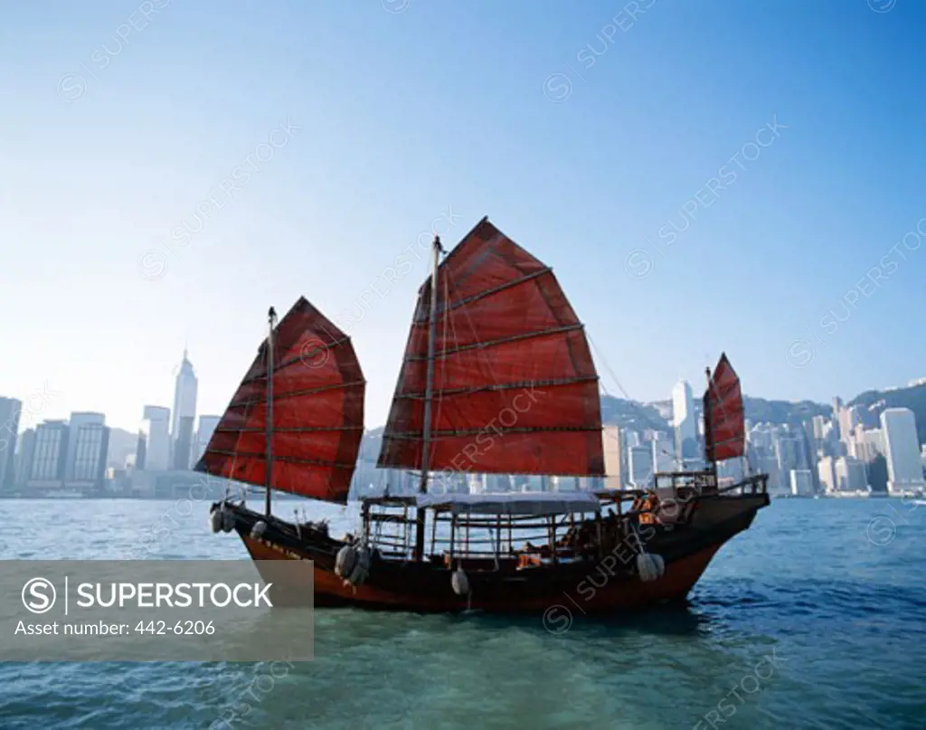 Junk sailing in Victoria Harbor, Hong Kong, China