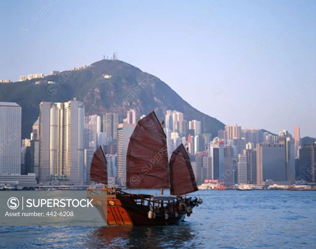 Junk sailing in Victoria Harbor, Hong Kong, China