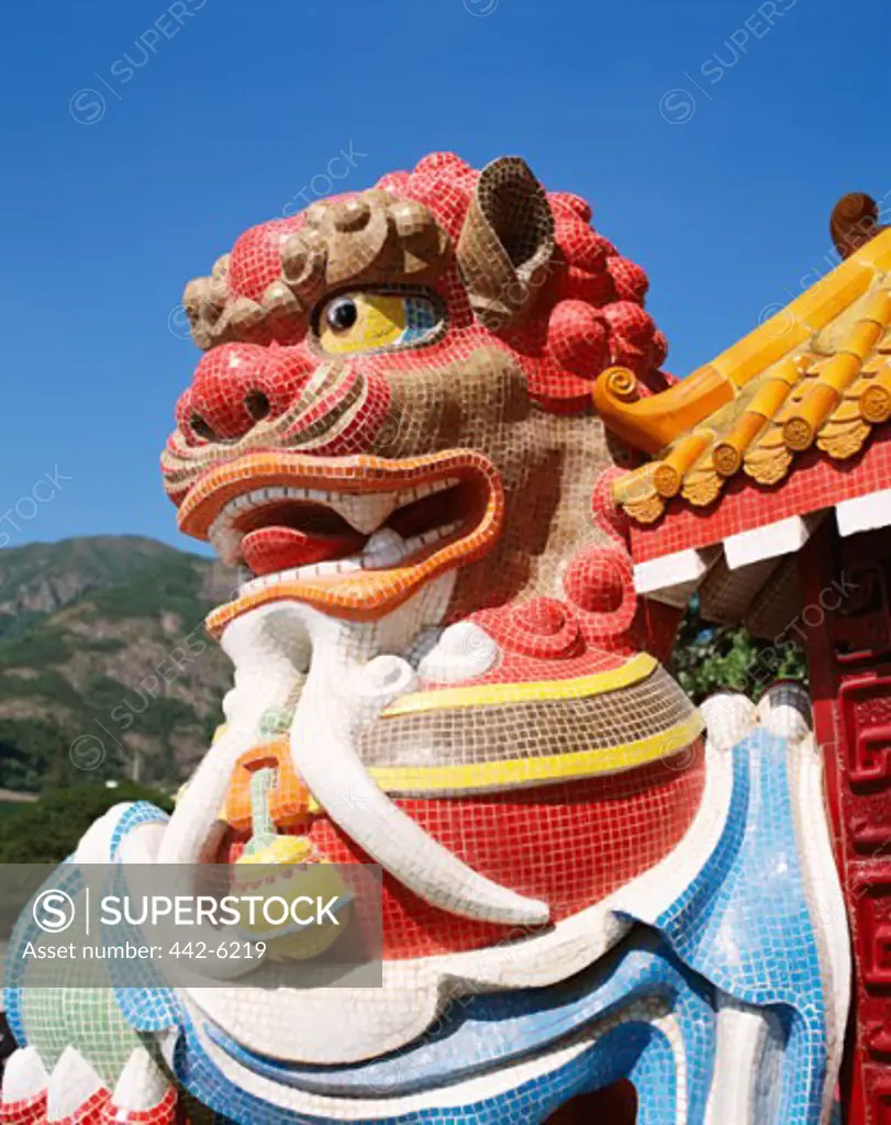 Low angle view of a lion statue, Repulse Bay Temple, Hong Kong, China