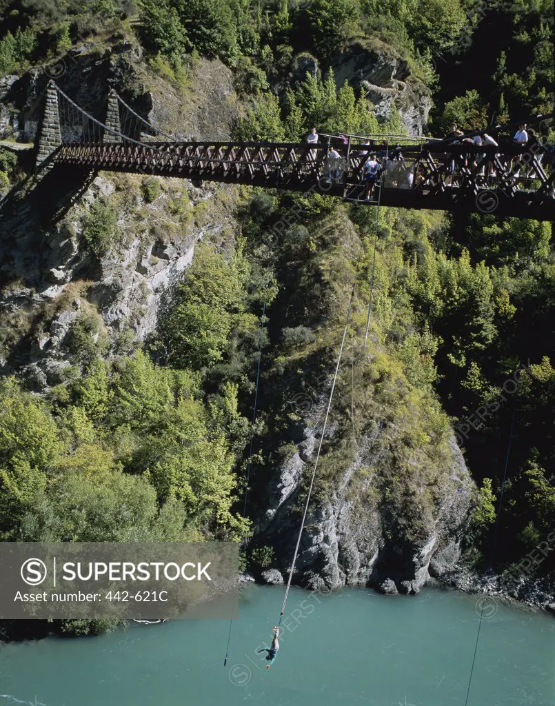 High angle view of a bungee jumper over a river, Queenstown, New Zealand