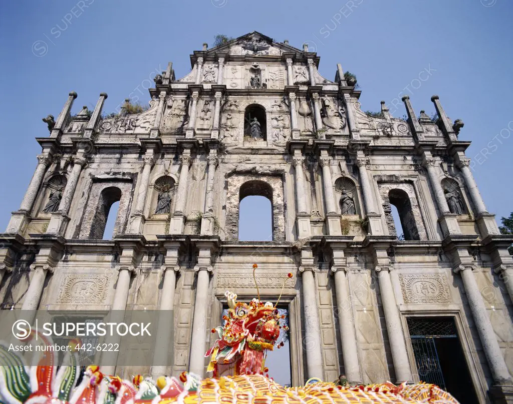Traditional dragon dance on Chinese New Year in front of a church, Sao Paulo Church, Macao, China