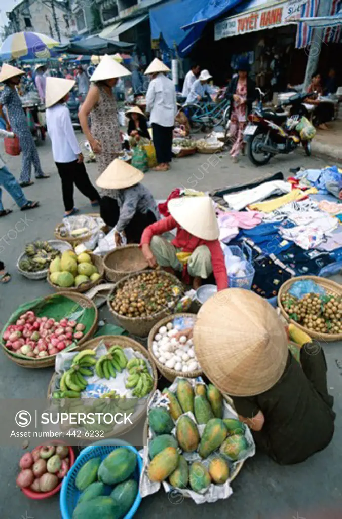 High angle view of fruit vendors in a market, Can Tho, Vietnam