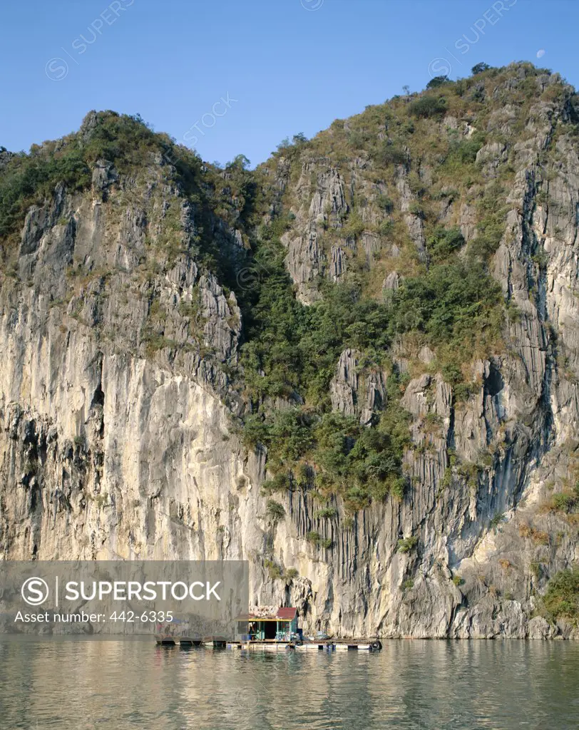 Houseboats on water, Karst Limestone Rocks, Ha Long Bay, Vietnam