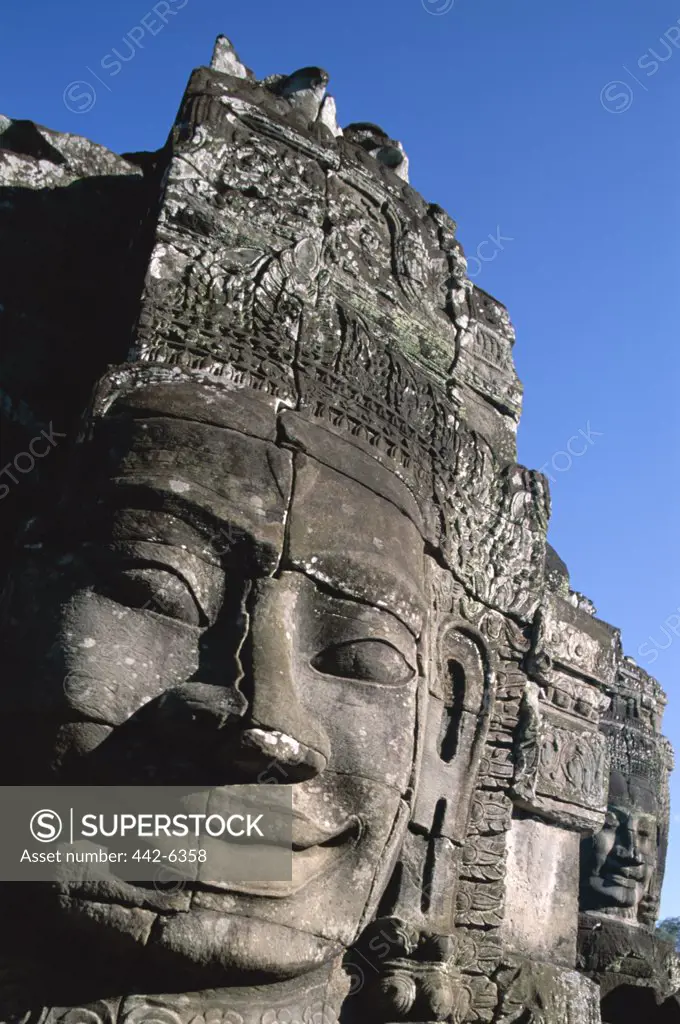 Carved face of Lokesvara on a Bayon temple, Angkor Thom, Siem Reap, Cambodia