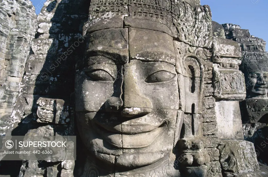 Close-up of the carved face of Lokesvara on a Bayon Temple, Angkor Thom, Siem Reap, Cambodia