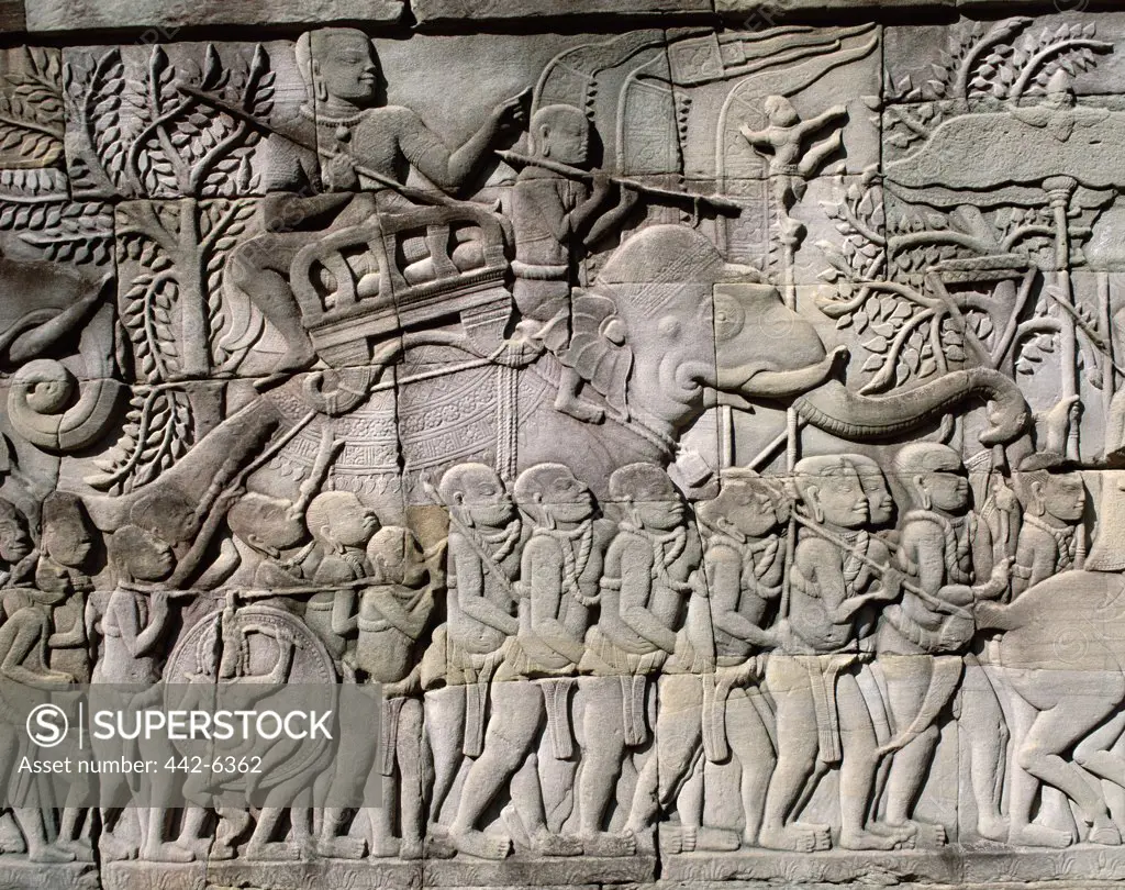 Close-up of carvings on a wall of a Bayon Temple, Angkor Thom, Siem Reap, Cambodia