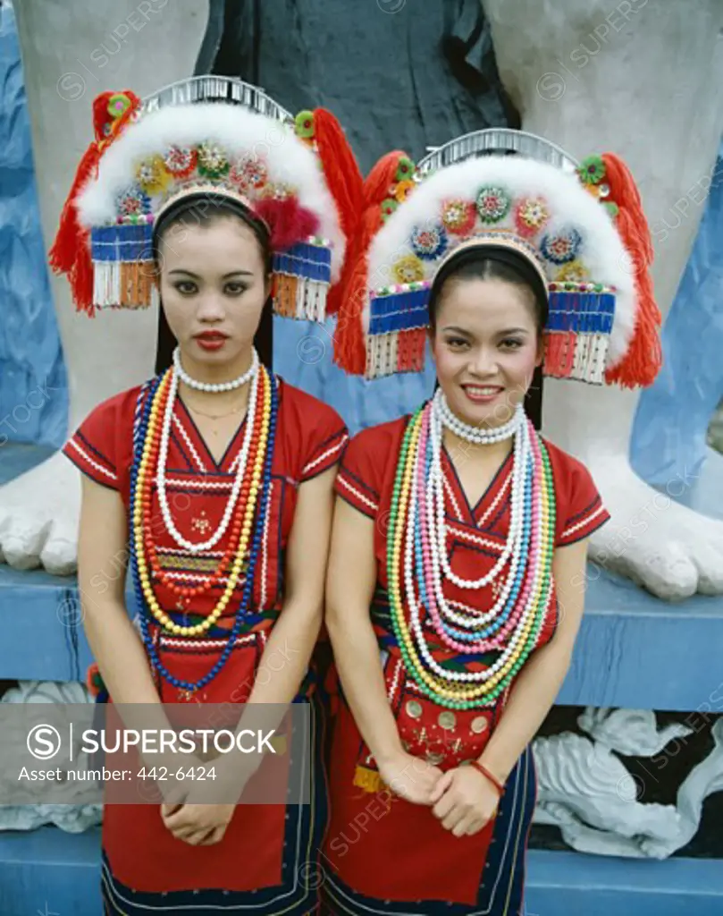 Portrait of two young women dressed in traditional costumes, Ami Minority Tribe, Taroko Gorge, Taiwan