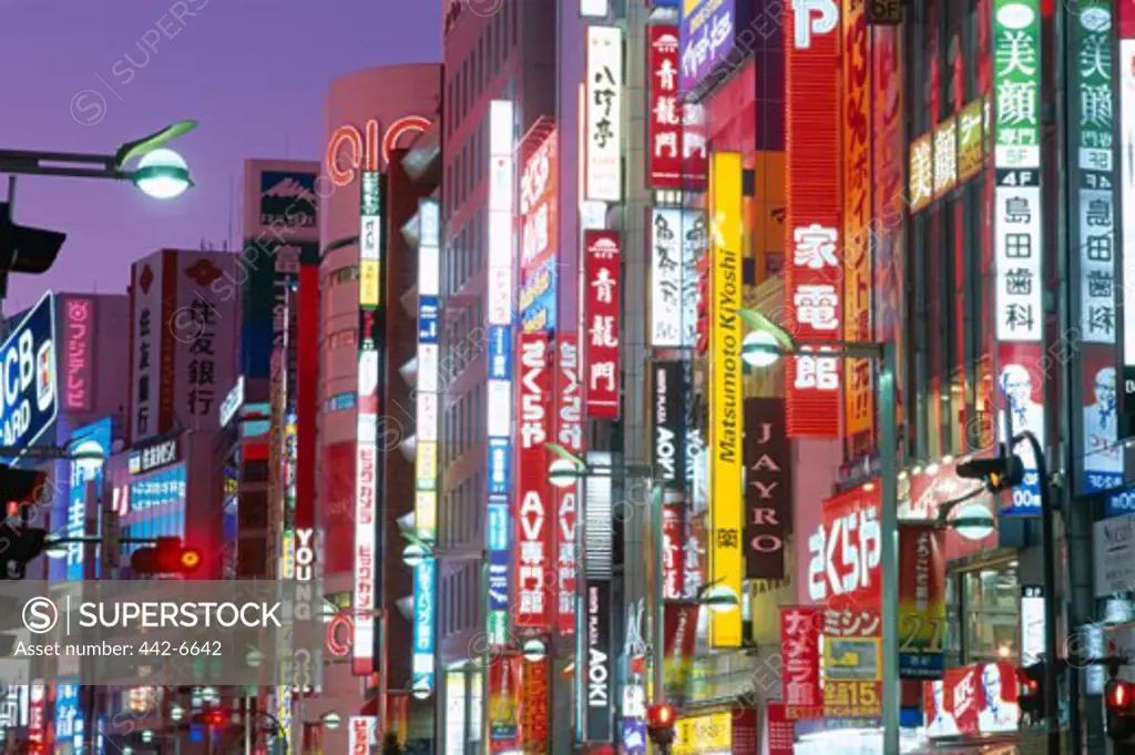Neon signs in a city, Shinjuku-dori, Shinjuku, Tokyo, Honshu, Japan