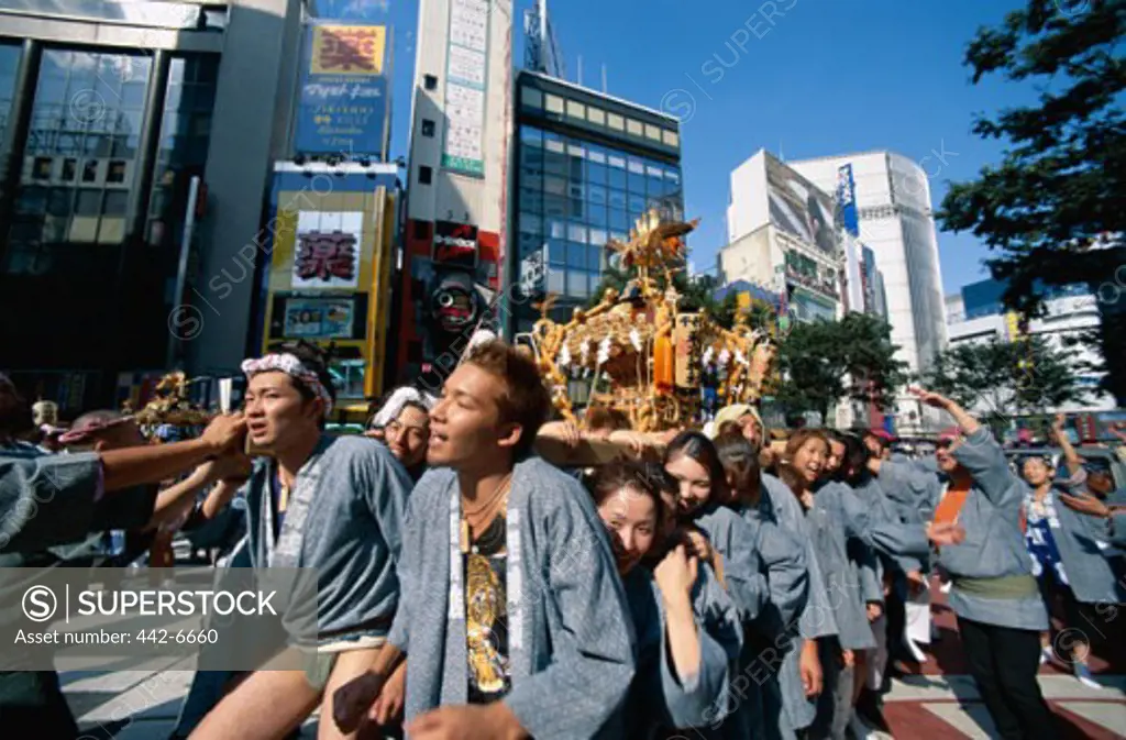 People carrying a Mikoshi Shrine, Matsuri Festival, Tokyo, Honshu, Japan