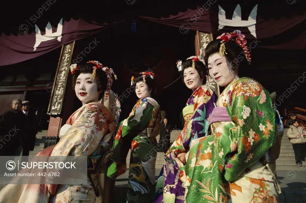 Group of geishas (Maiko) dressed in kimonos, Kyoto, Honshu, Japan