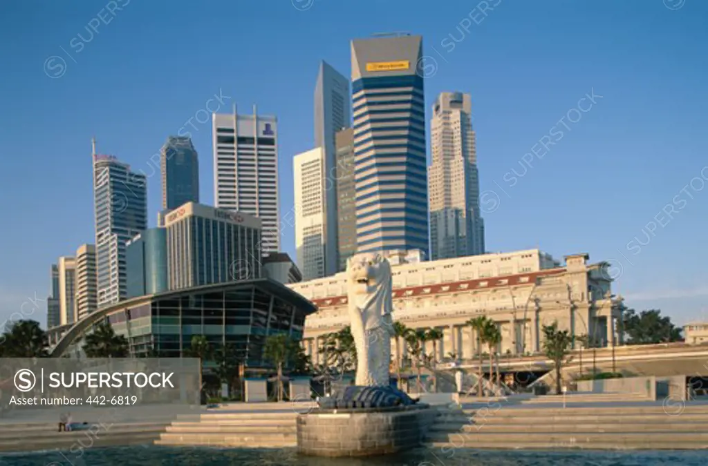 Low angle view of the Merlion Statue and Fullerton Building, Singapore