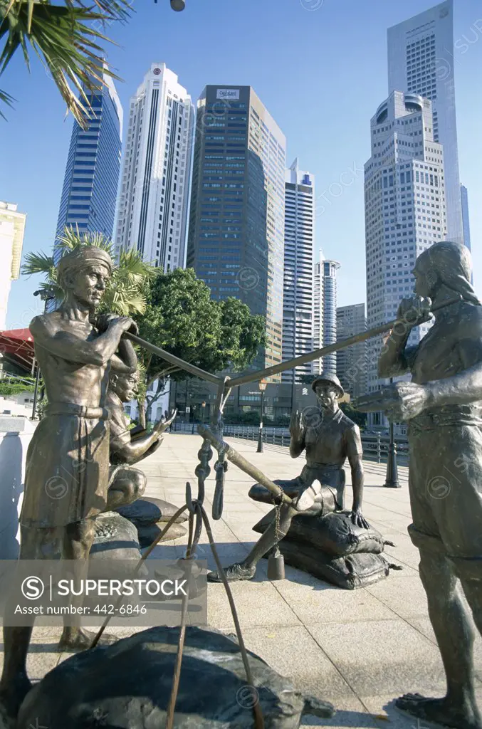 Statue of the Great Emporium by Malcolm Koh, River Walk, Singapore