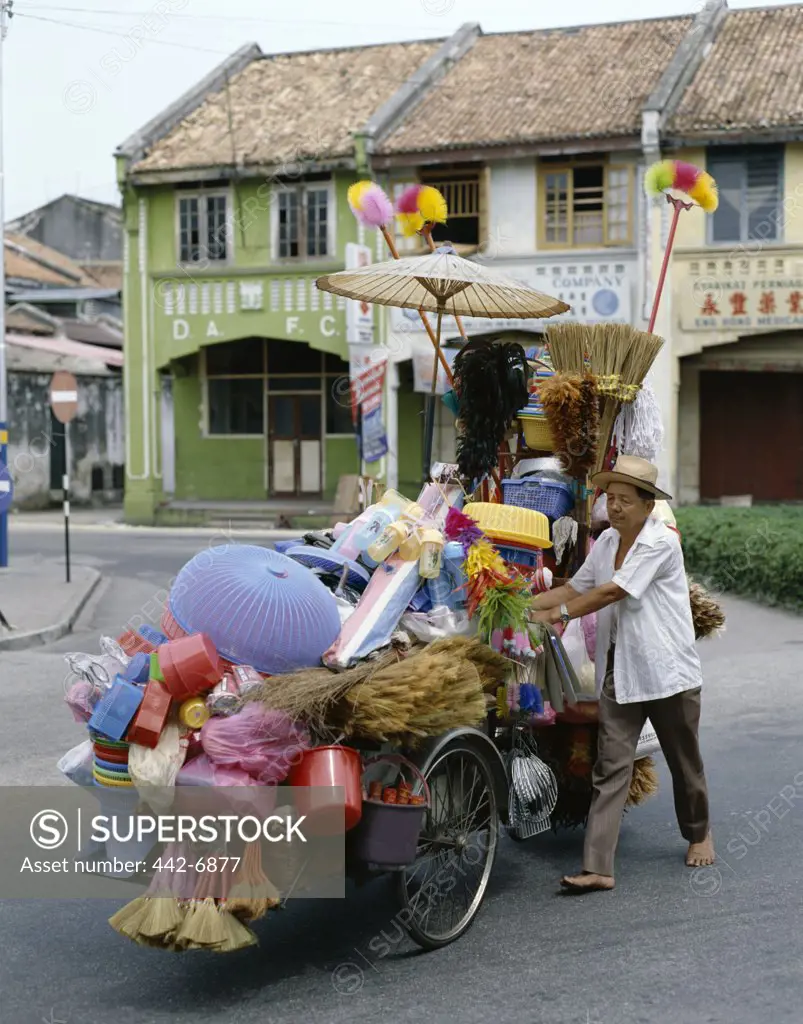 Street vendor selling household items, Penang, Malaysia