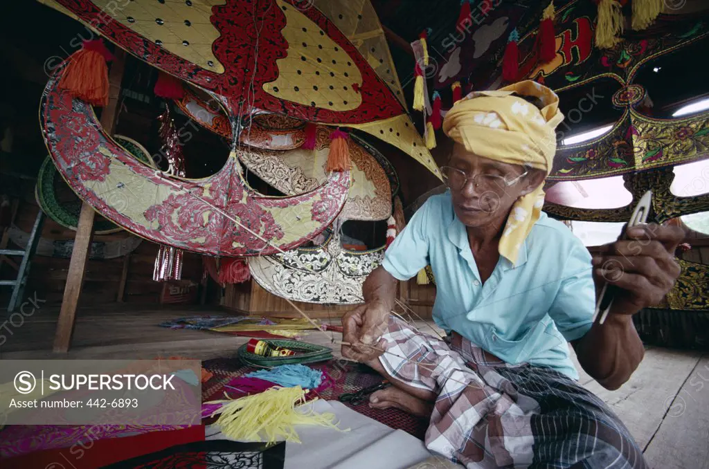 Kite maker making kites, Kota Bharu, Kelantan, Malaysia