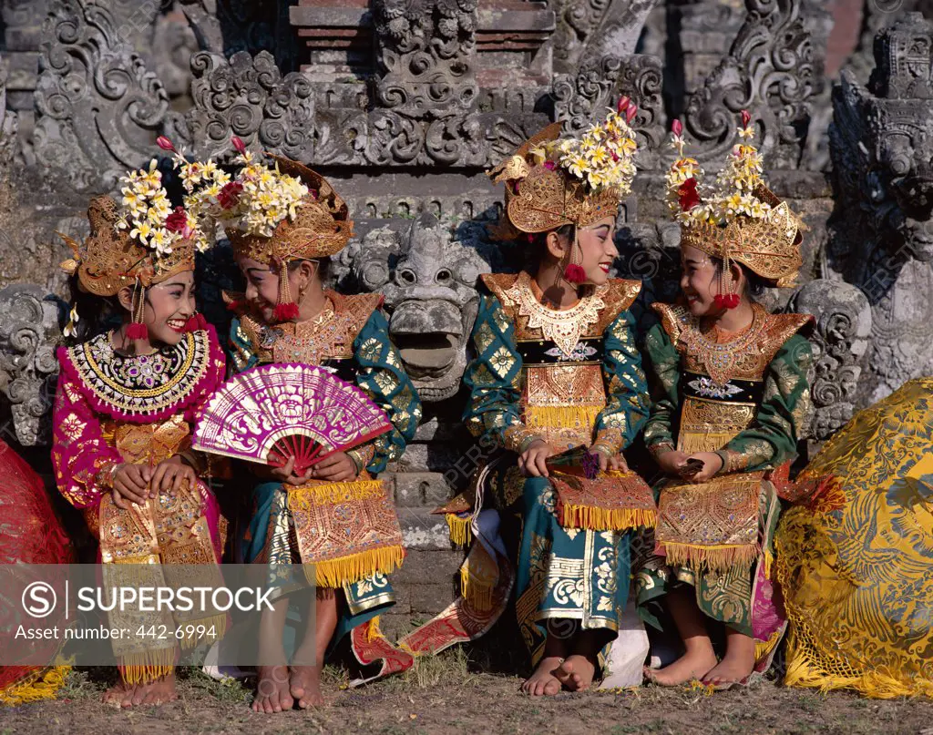 Group of Legong dancers dressed in traditional costumes, Bali, Indonesia