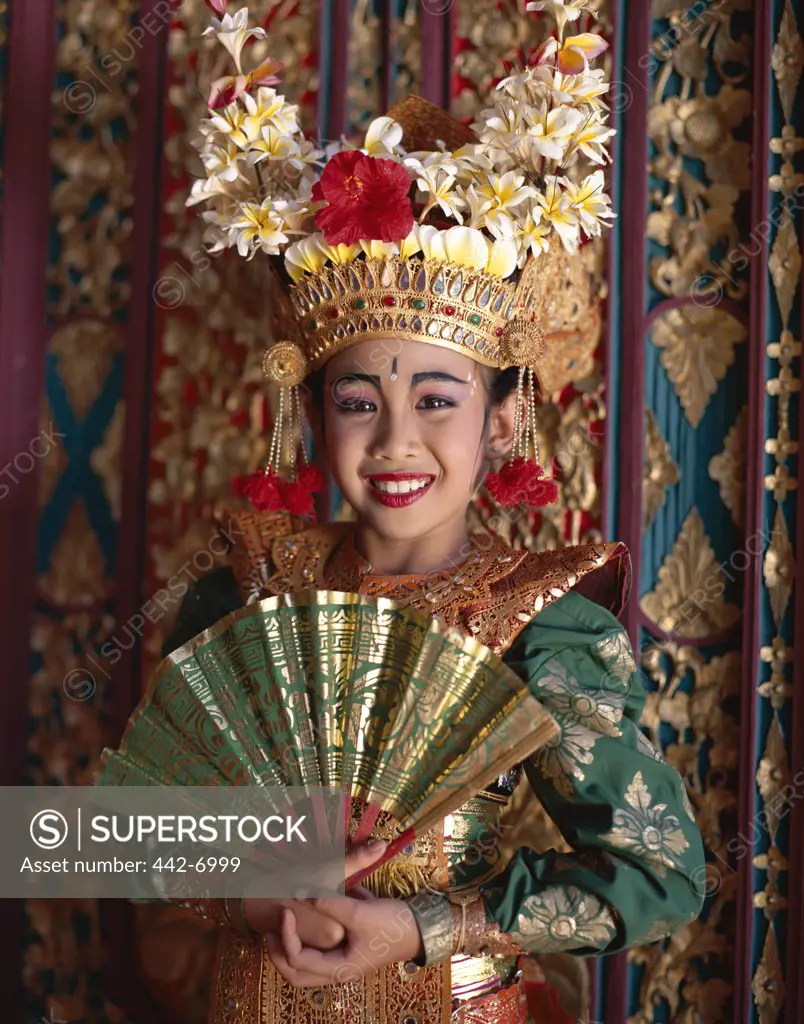 Portrait of a Legong dancer dressed in a traditional costume, Bali, Indonesia