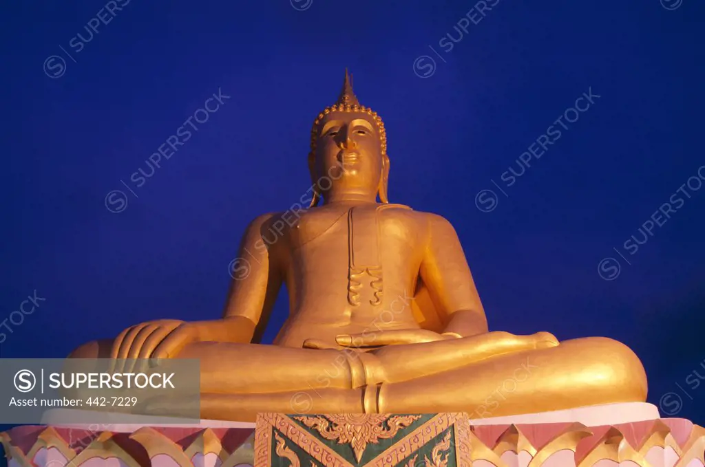 Low angle view of a gold Buddha statue, Big Buddha, Ko Faan, Ko Samui, Thailand