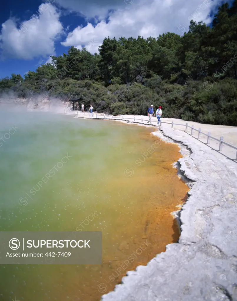 People standing at a thermal pool, Champagne Pool, Waiotapu Thermal Area, Rotorua, New Zealand